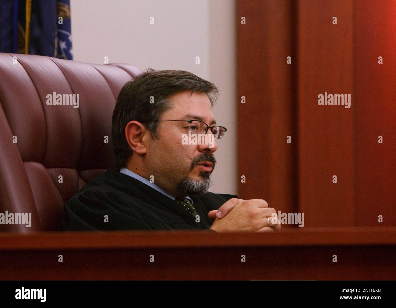 Judge Deno G. Himonas speaks to Jesus A. Jimenez the getaway