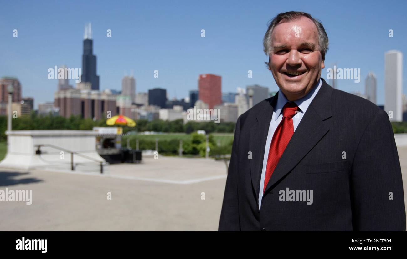 Chicago Mayor Richard M. Daley poses with the city skyline behind him ...