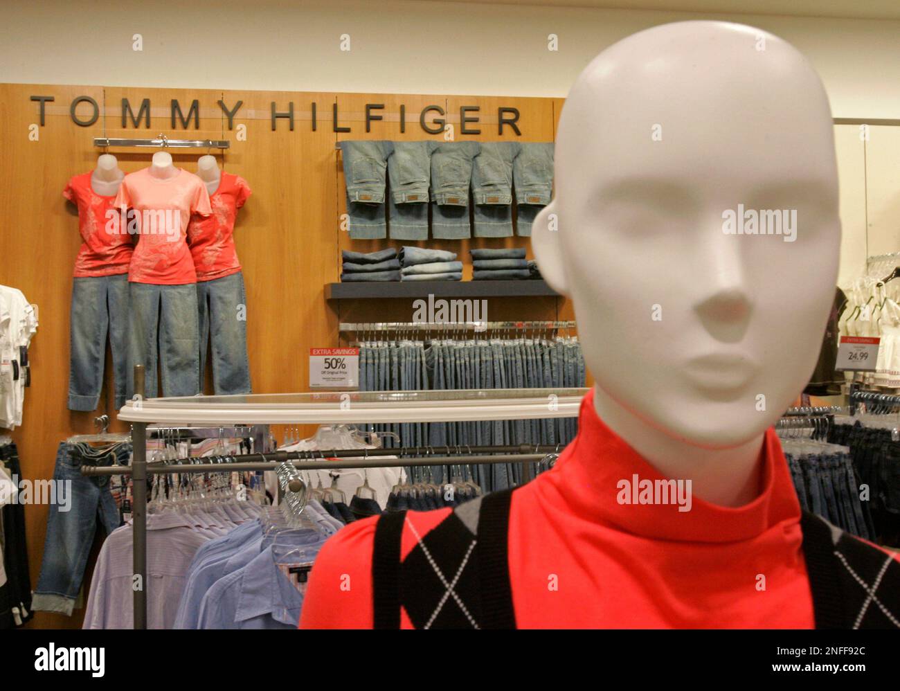 A mannequin stands in the Tommy Hilfiger clothing section at the Macy's store in Kenwood Towne Centre, Aug. 2008, in Cincinnati. Macy's Inc. stores are gearing up for the Sept.