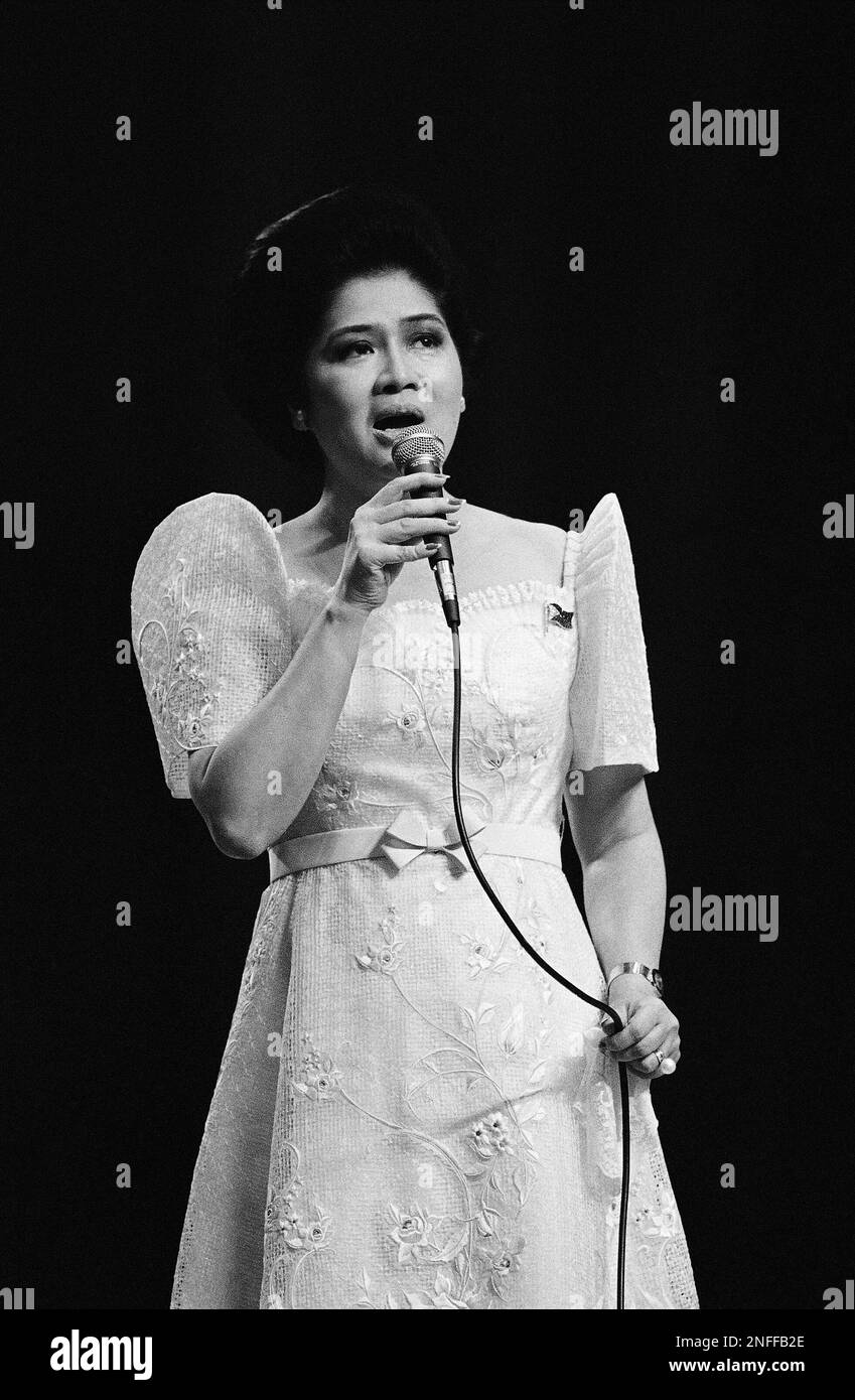 Imelda Marcos, wife of Philippines President Ferdinand Marcos, sings