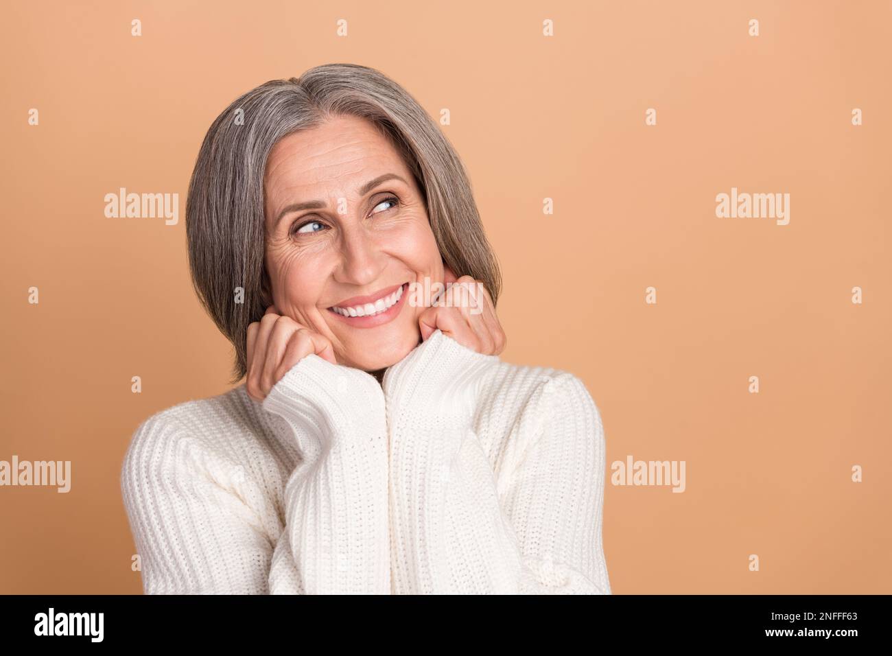 Photo portrait of pretty lovely attractive retired lady touch cheeks ...