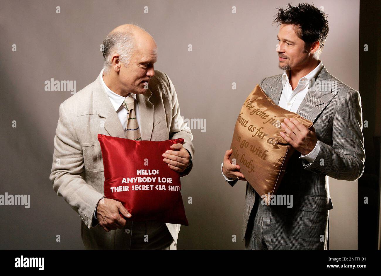 ** EDS NOTE OFFENSIVE LANGUAGE ON PILLOW ** Actors Brad Pitt and John