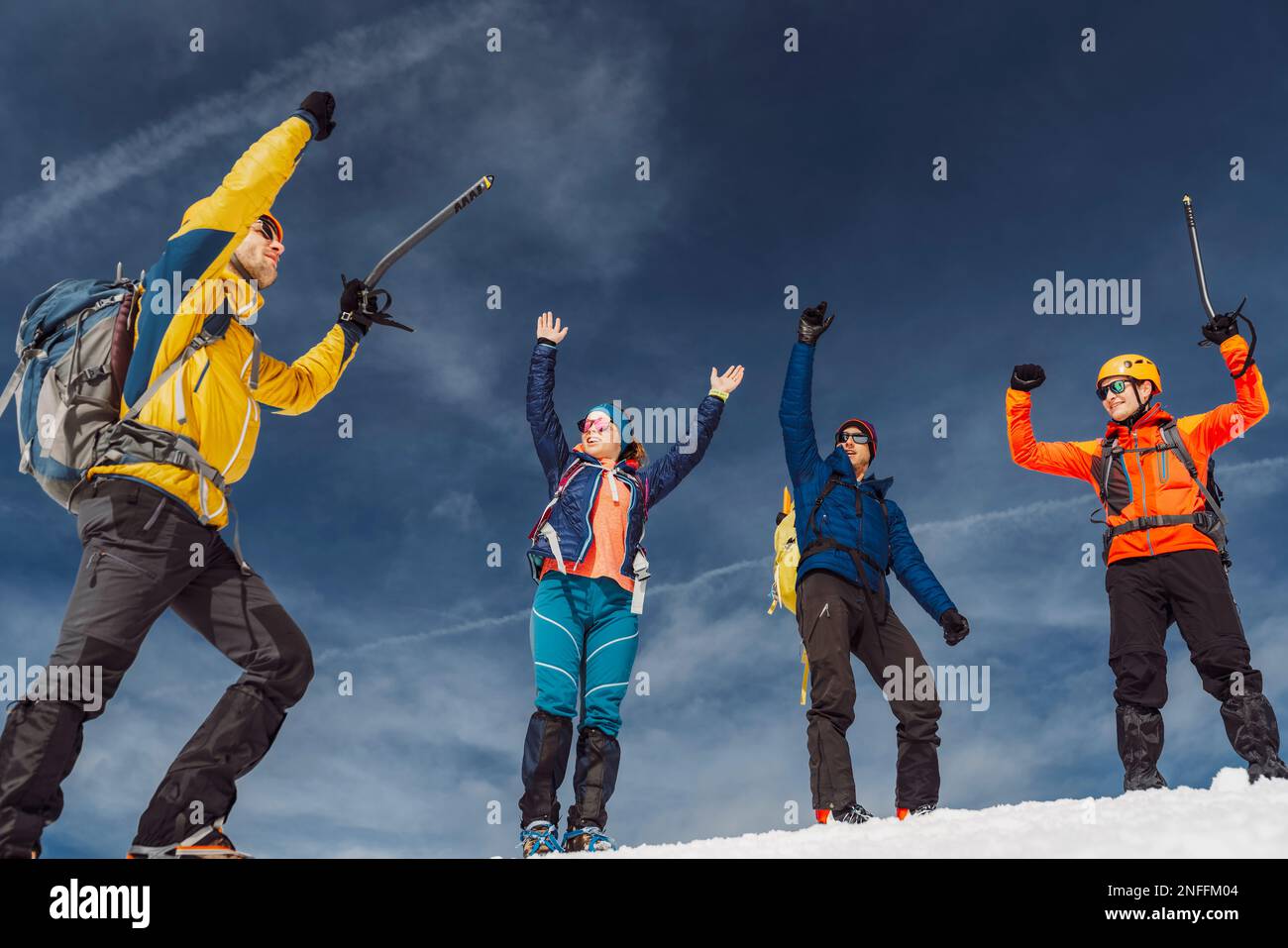 Mountaineer reaching top snowy mountain hi-res stock photography and ...