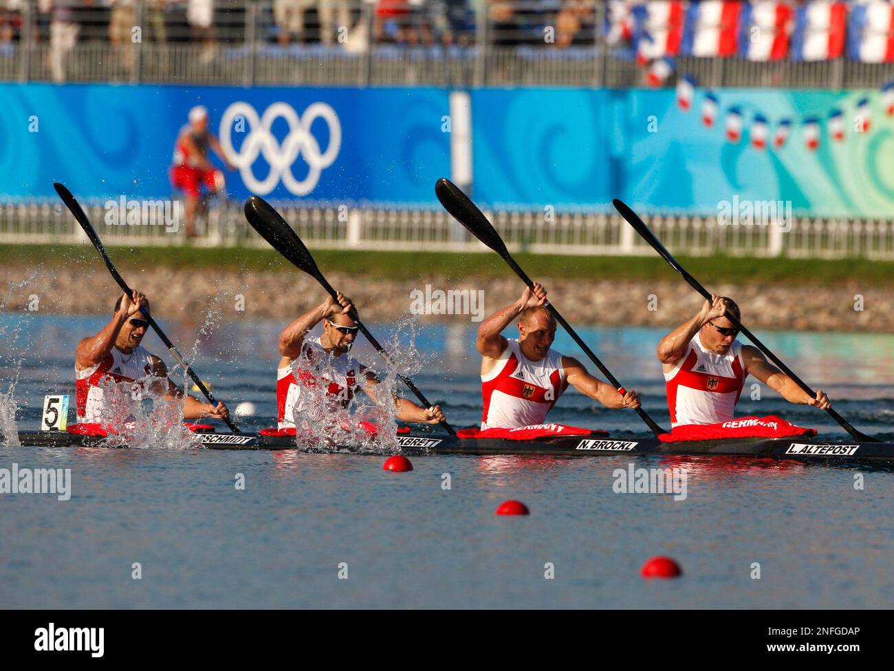 From right, Germany's Lutz Altepost, Norman Brockl, Torsten Eckbrett and Bjorn Goldschmidt paddle to place third in the Kayak Four 1000m men's final at Beijing 2008 Olympics, Friday Aug. 22, 2008. (AP
