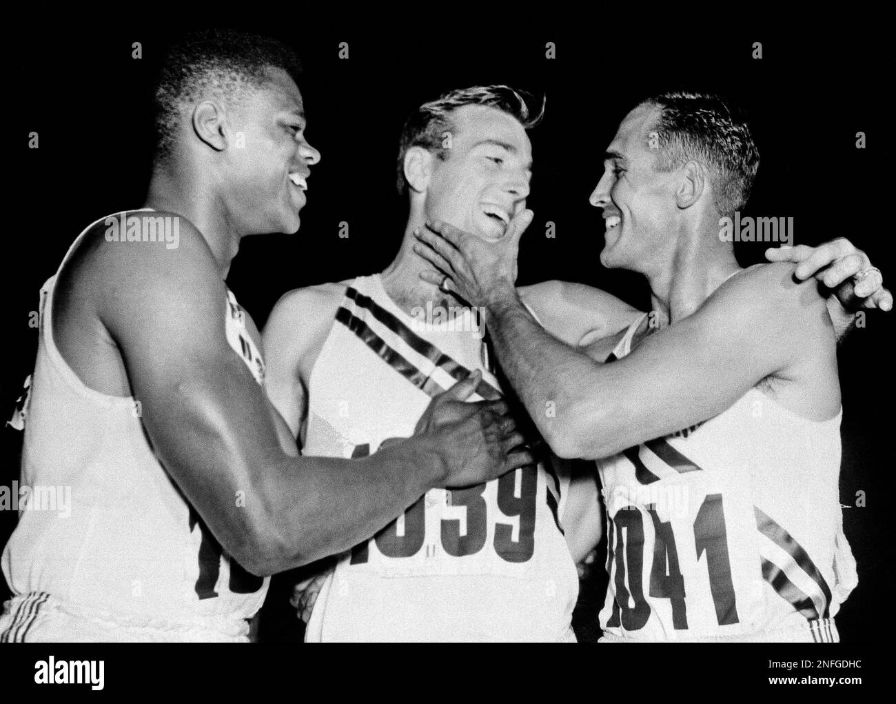 A happy trio of Americans celebrates their sweep of the Olympic