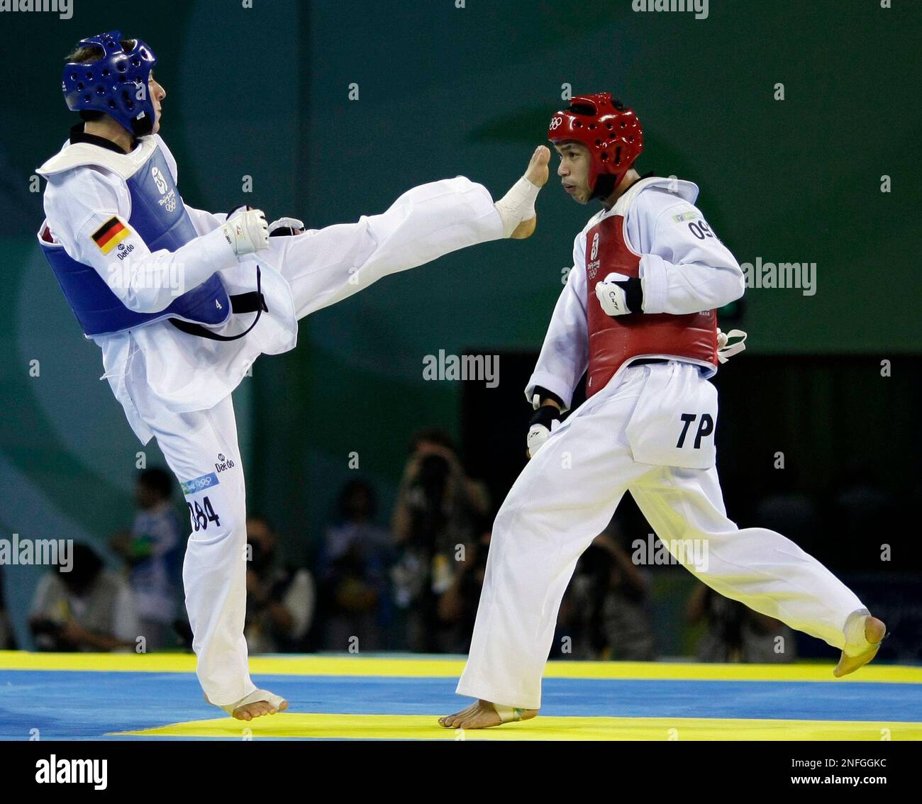 Winner Taiwan's Sung Yu-Chi, right, fights Germany's Daniel