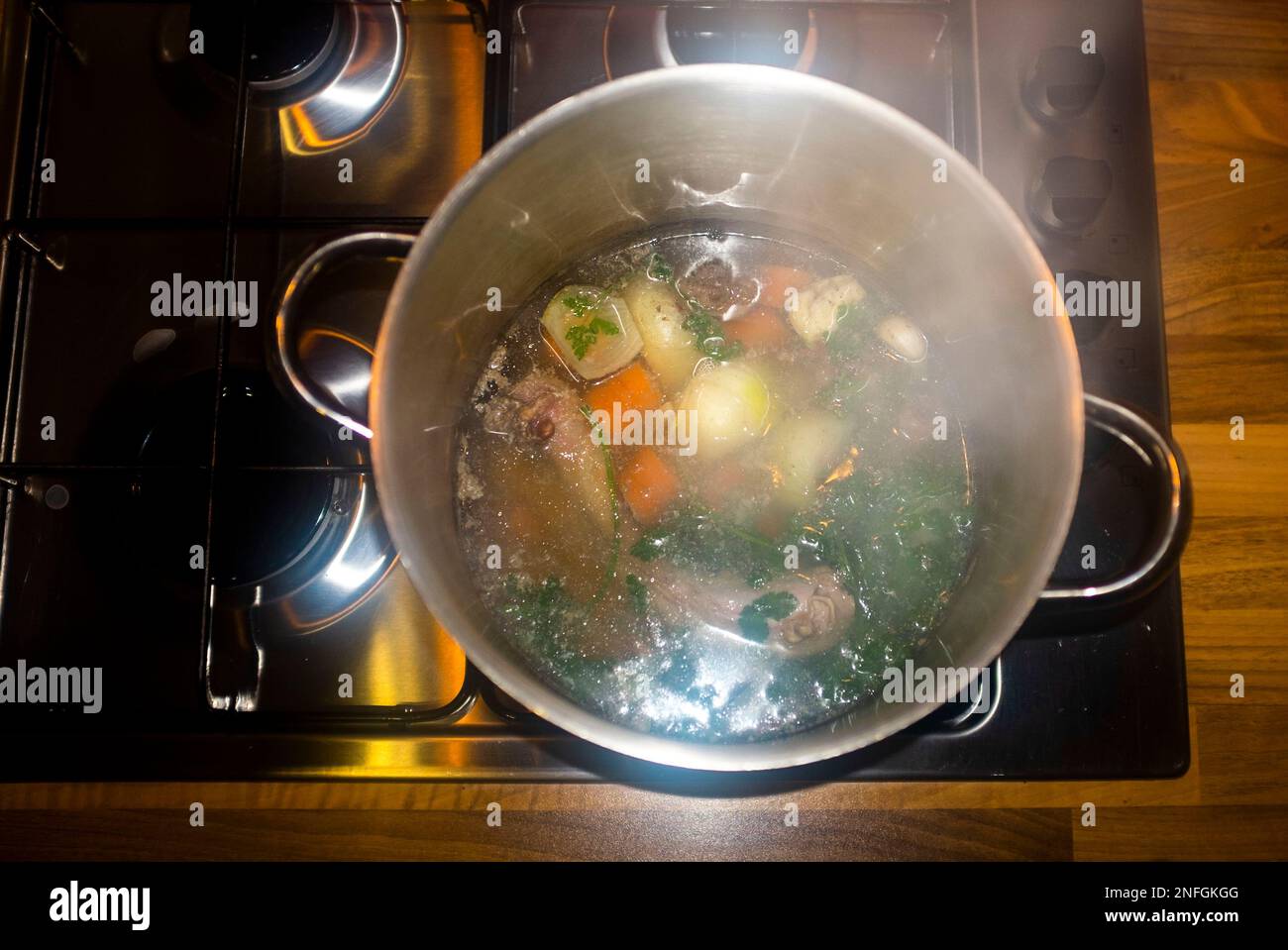 Making a stock from turkey giblets and neck with onion carrots and