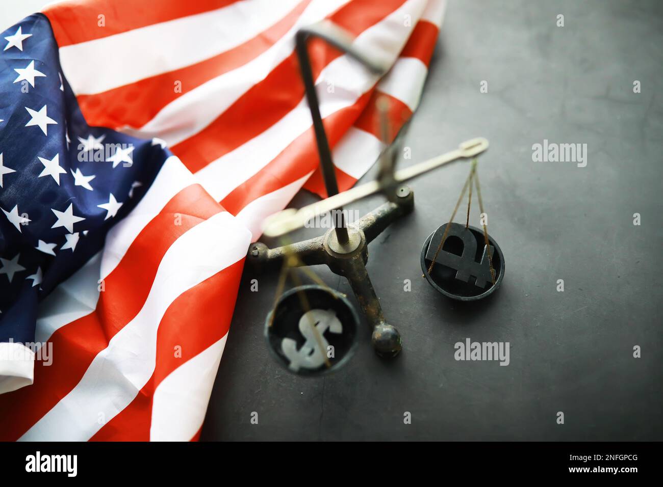 United States Law, scales of justice and American flag. Concept. Money