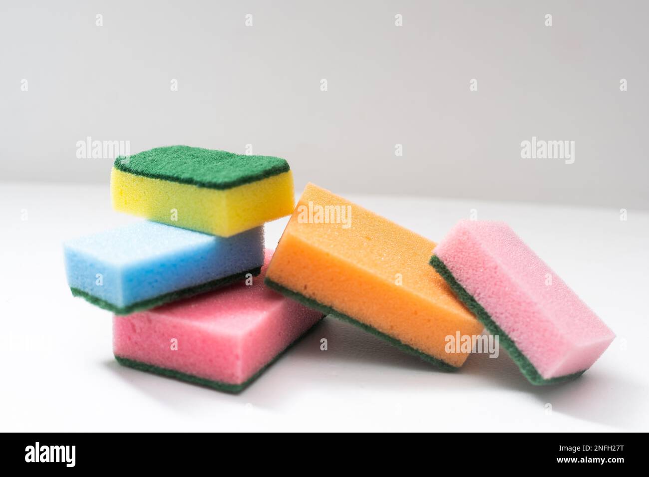 Kitchen dishcloth cleanup concept housework. Colorful kitchen