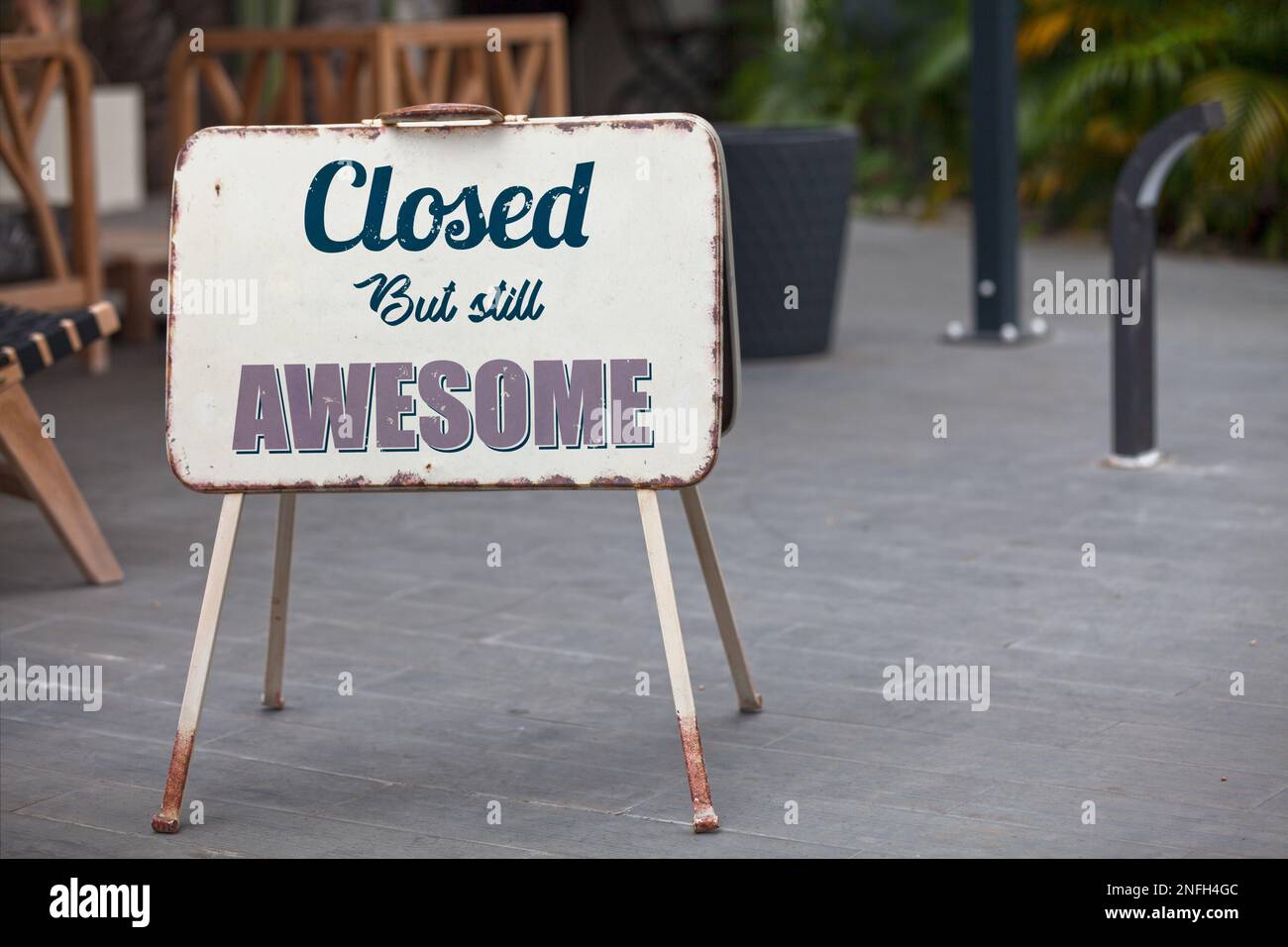 Outdoor open sign with written in it