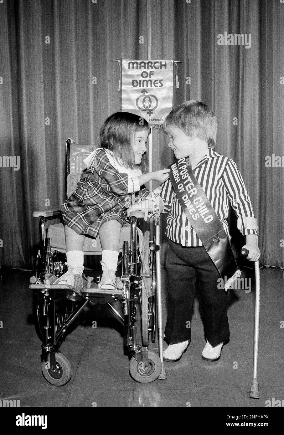Last year's March of Dimes poster child, Christine Petrilli, 6, checks