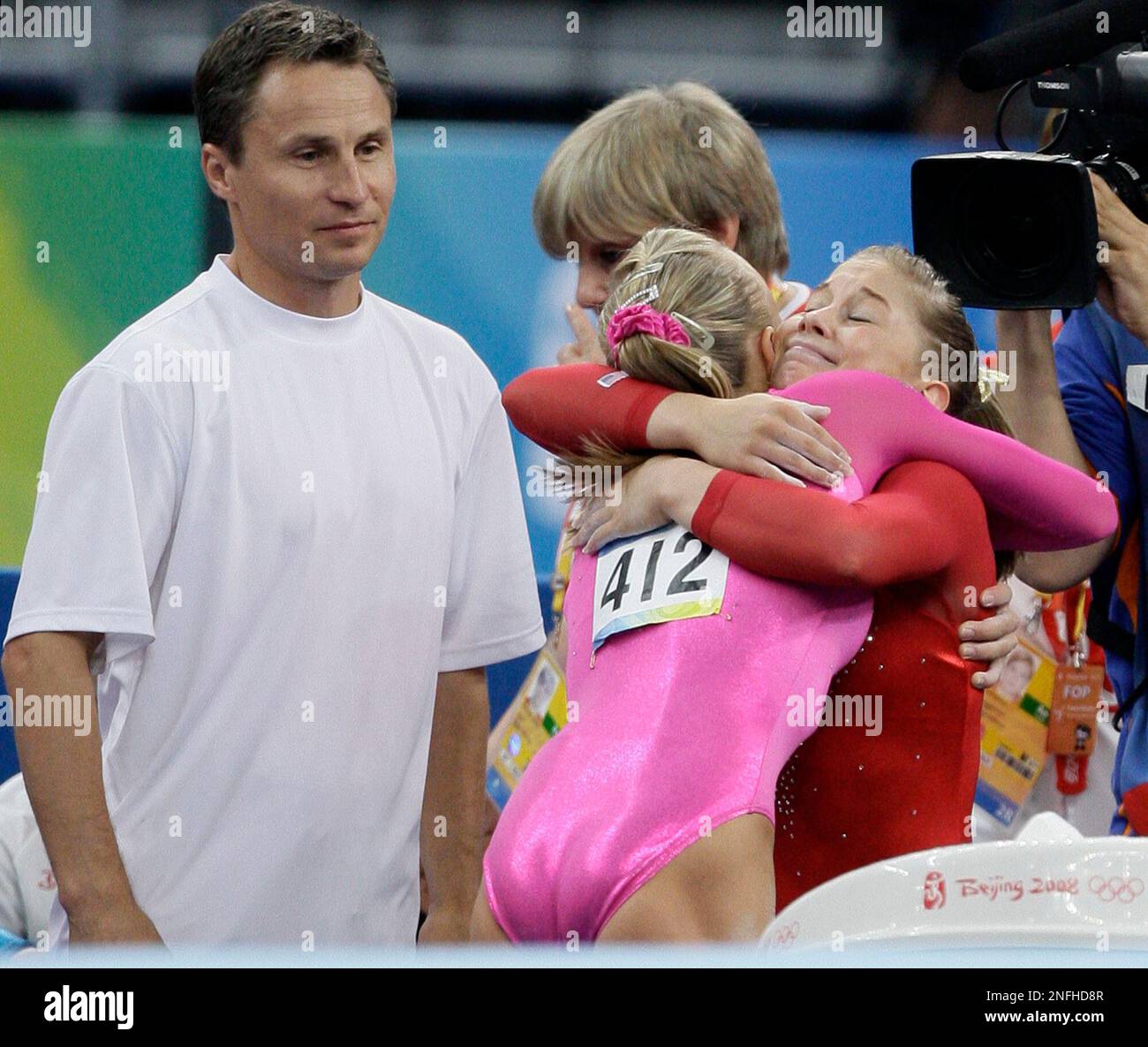 U.S. gymnasts Shawn Johnson, right, and Nastia Liukin embrace after the