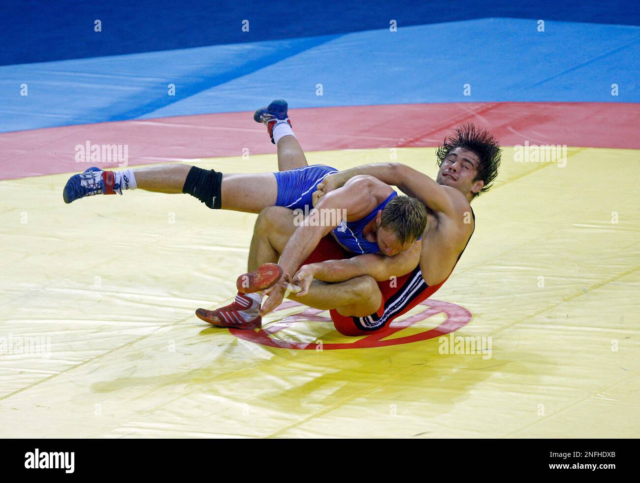 usa-s-brad-vering-blue-wrestles-with-armenia-s-denis-forov-during-the