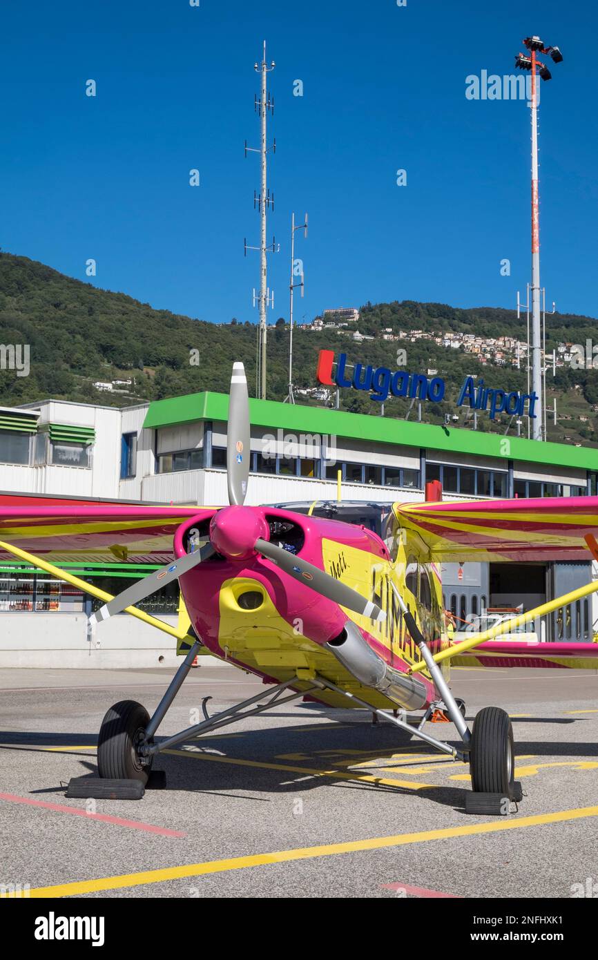 Switzerland, AgnoLugano Airport, Plane stationed on the runway Stock