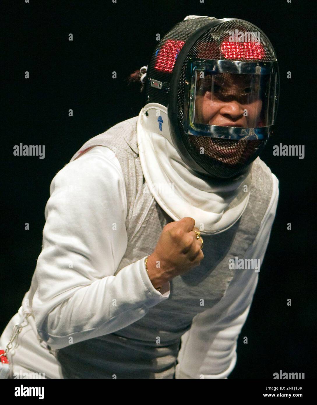 Canada's Jujie Luan, from Edmonton, reacts after scoring a point