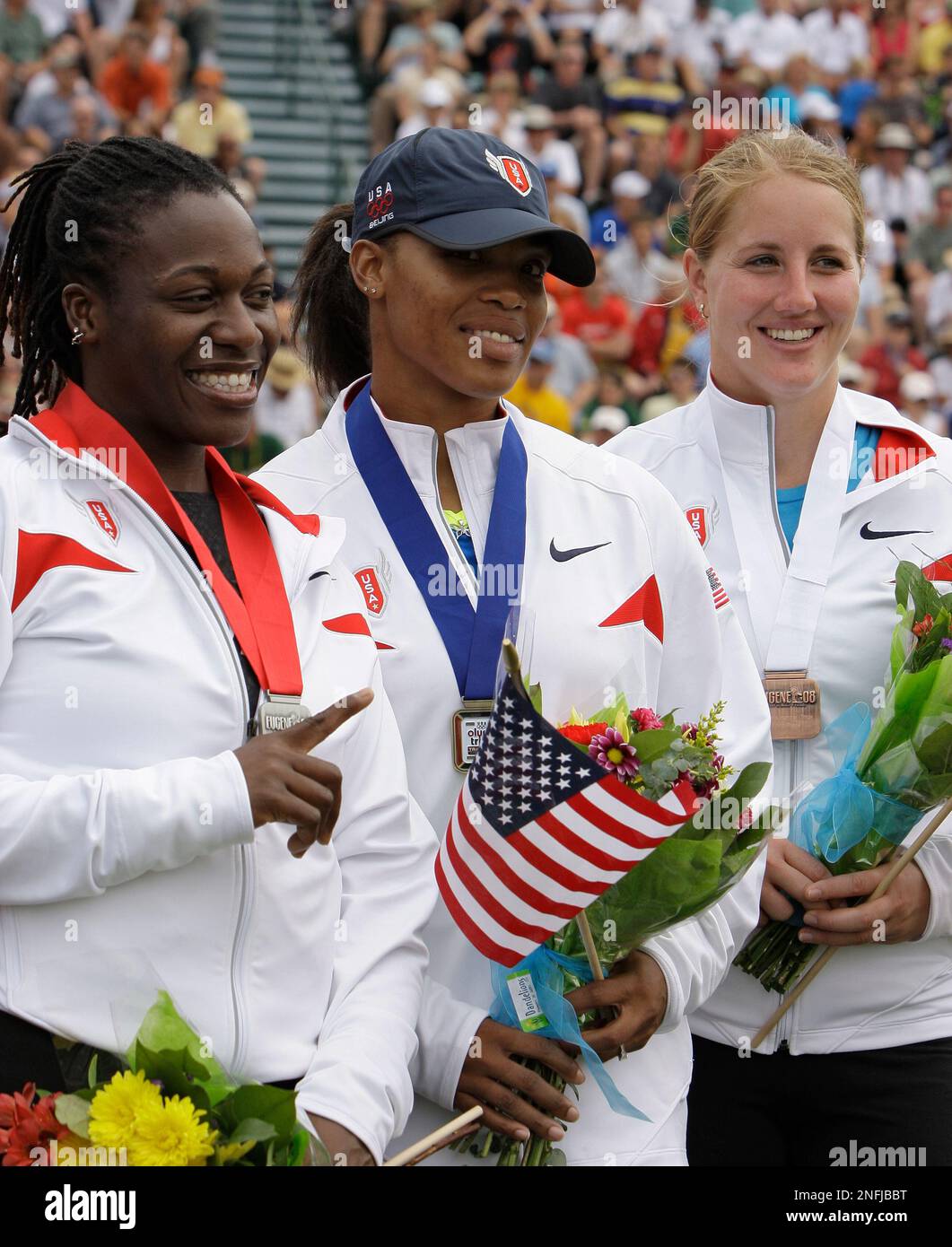 From left, winners in the women's hammer throw final Sarah Veress, Jessica Cosby and Amber