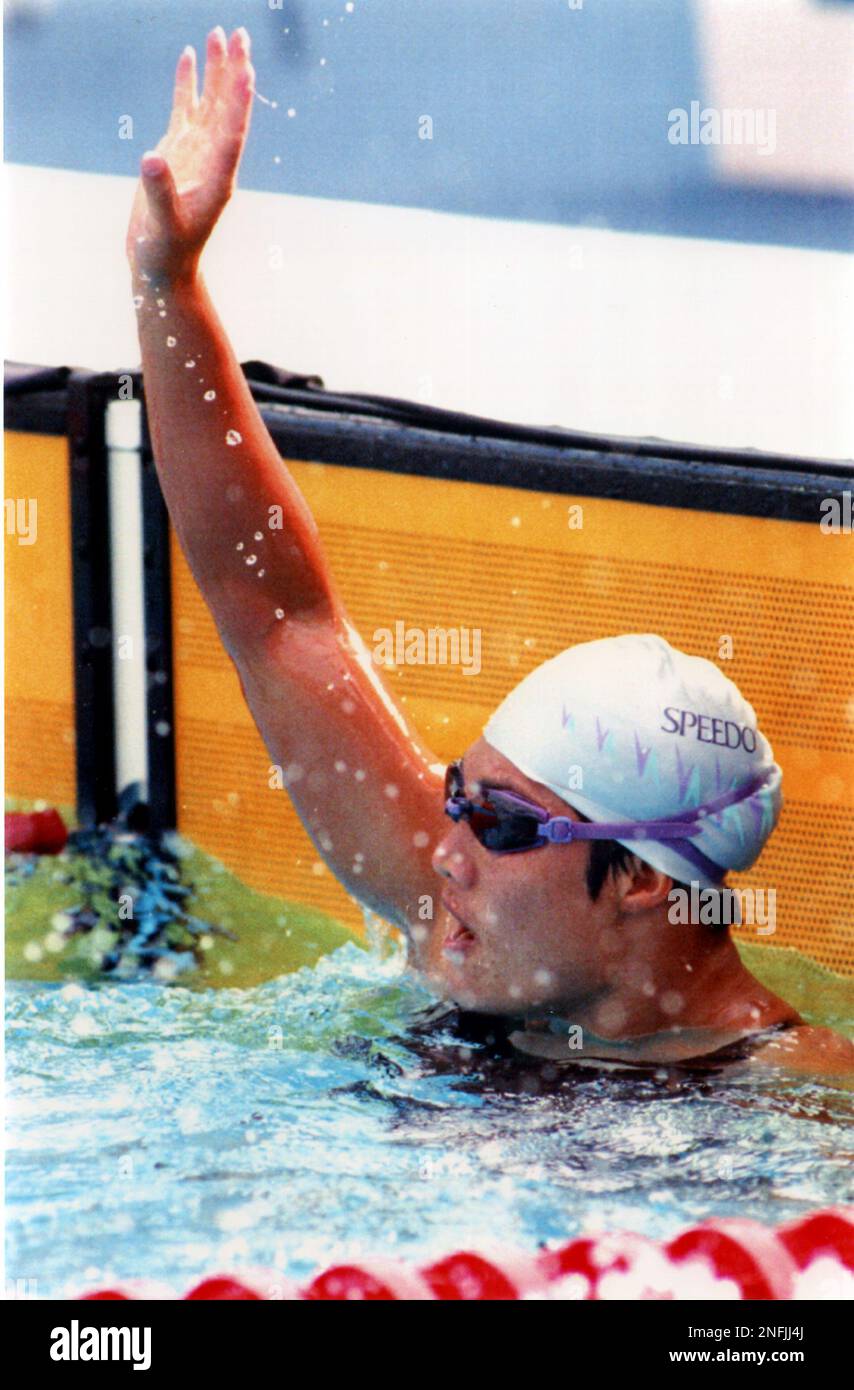 China's Lin Li celebrates after breaking an 21-year-old world record in ...