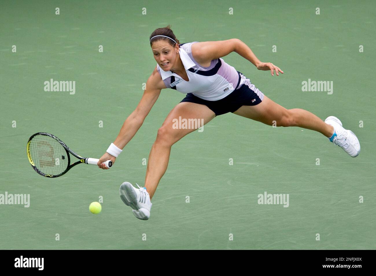 Canada's Stephanie Dubois from Laval, Que. lunges to return to Maria  Kirlenko from Russia during second round play at the Rogers Cup tennis  tournament Wednesday, July 30, 2008 in Montreal. (AP Photo/The