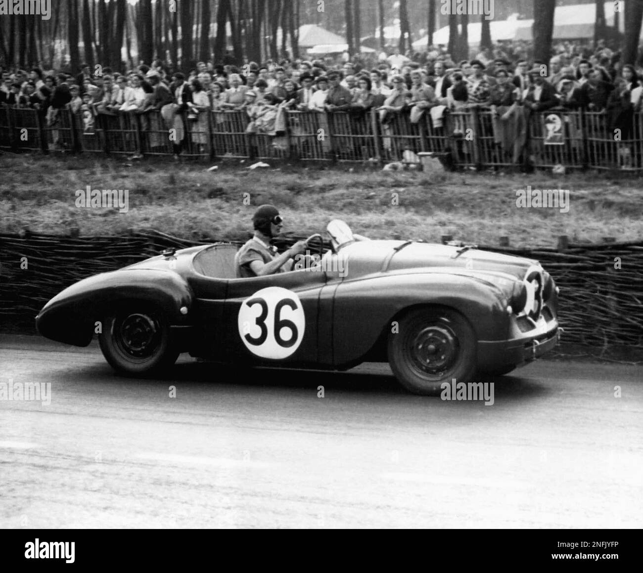 T.H. Wisdom is pictured here at the wheel of the new JowettJavelin