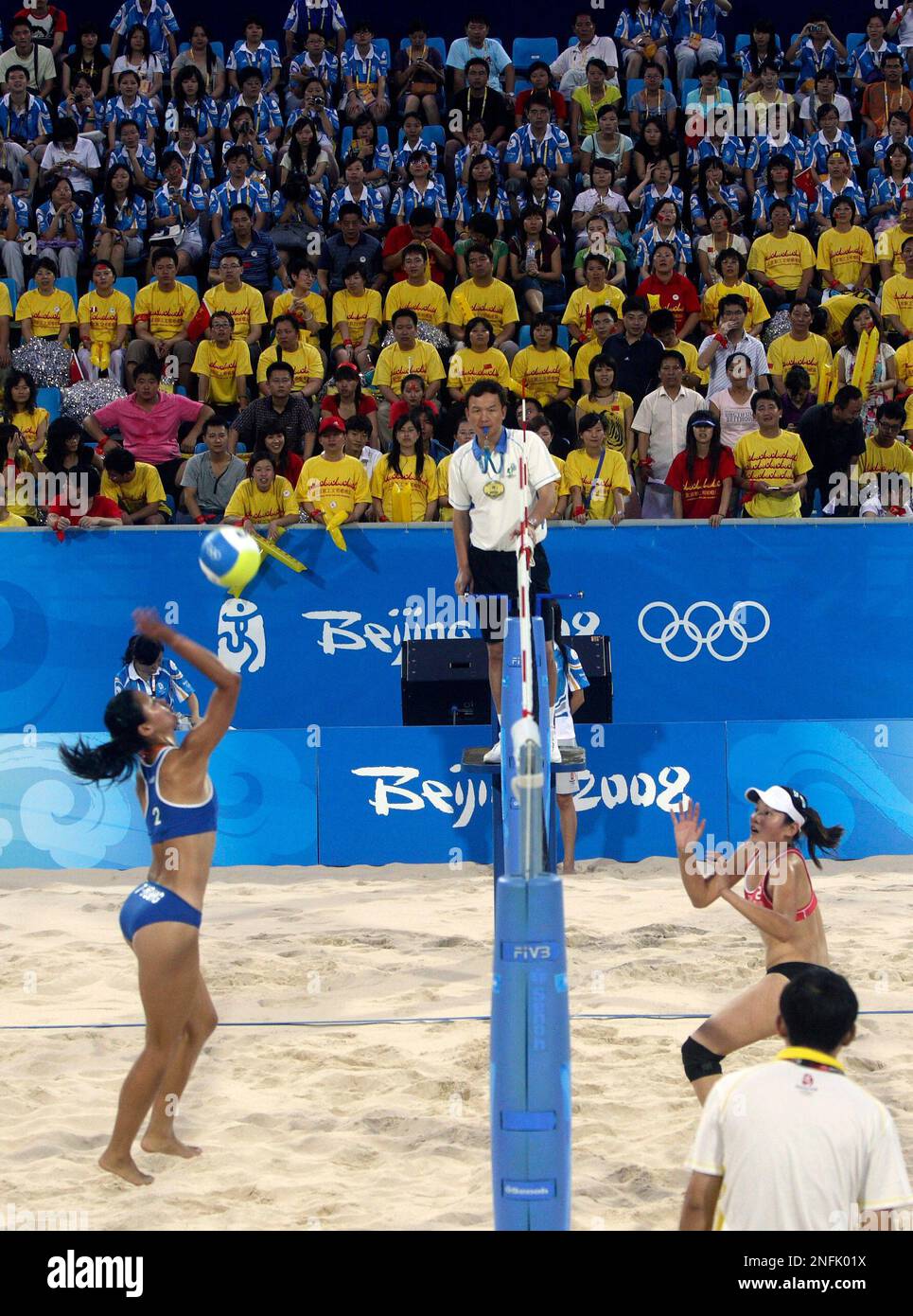 Chinese officials, athletes and cheerleaders rehearse on a test match ...