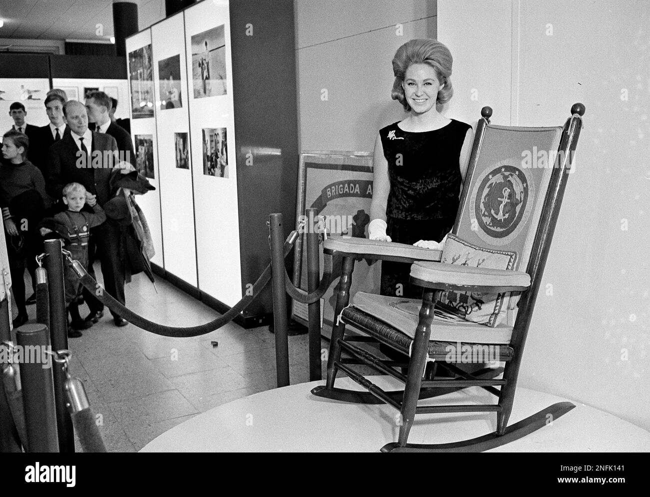 Joan Kennedy stands behind Pres. John F. Kennedys famed rocking chair