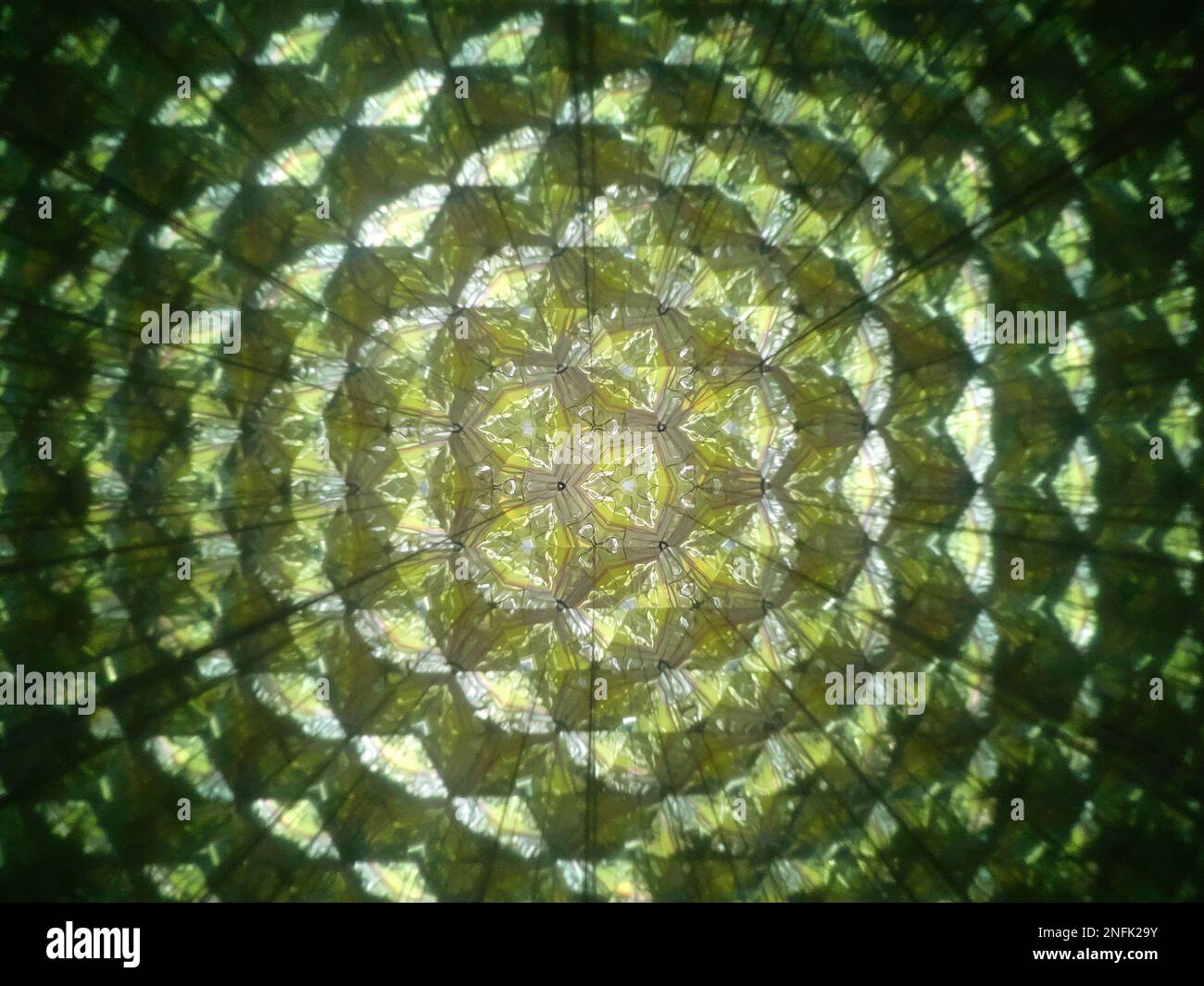 Close-up through kaleidoscope with funny pattern Stock Photo