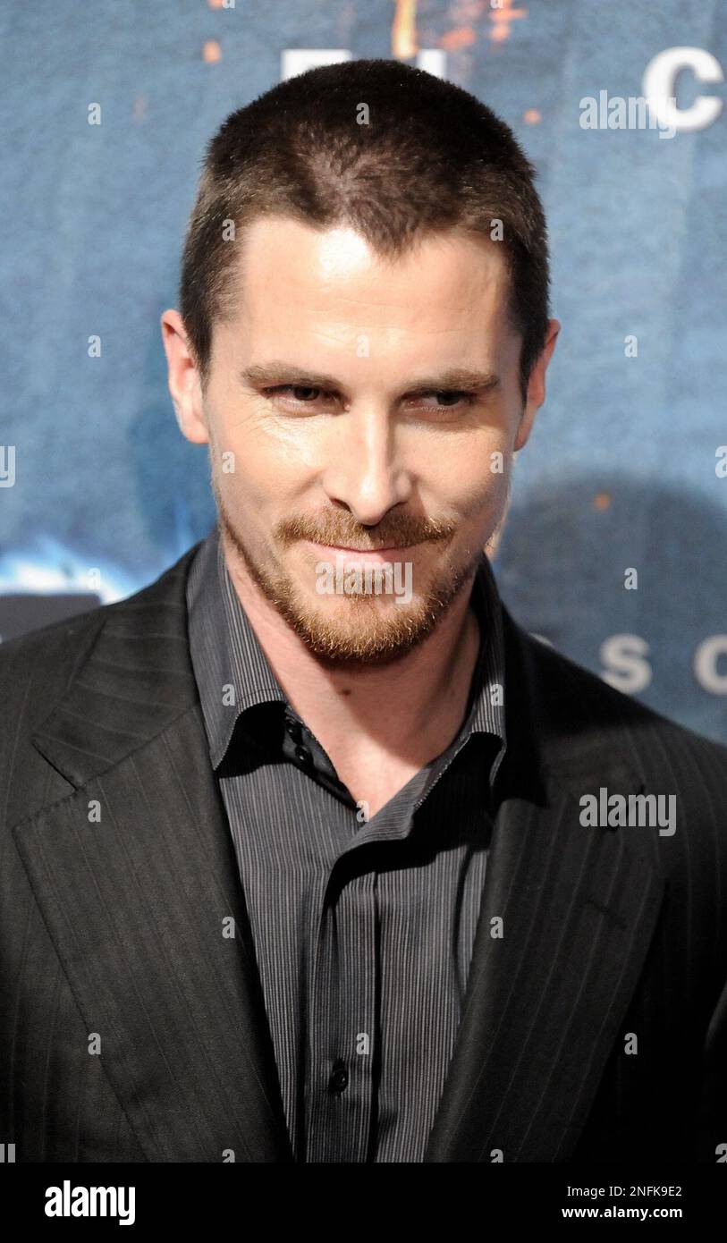 British actor Christian Bale poses during a photocall for 'The Dark