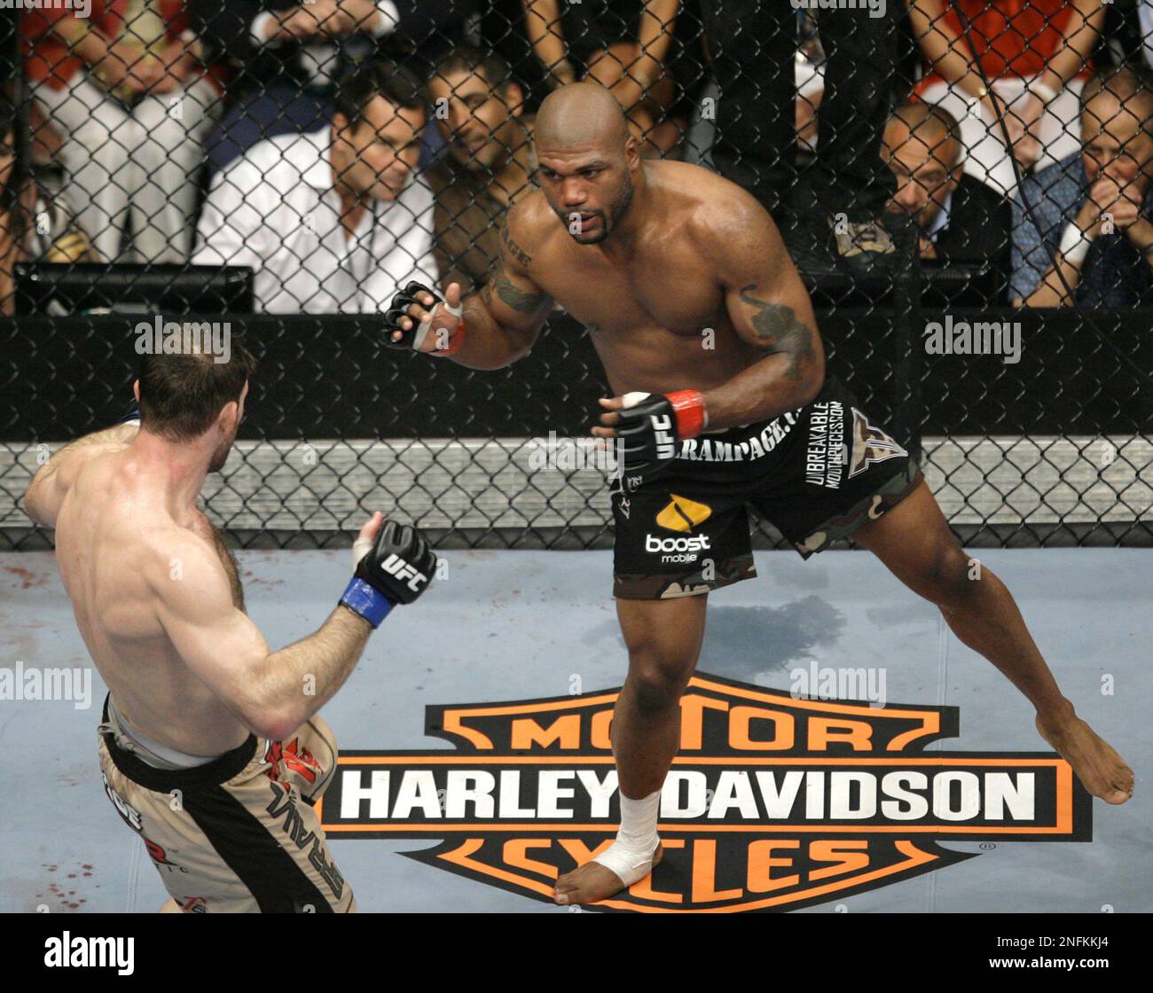 Forrest Griffin, left, competes against Quinton Jackson during their