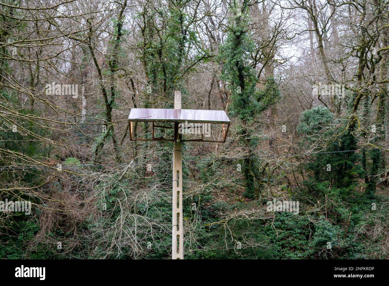 Stationary small solar battery on a concrete pole. Stock Photo