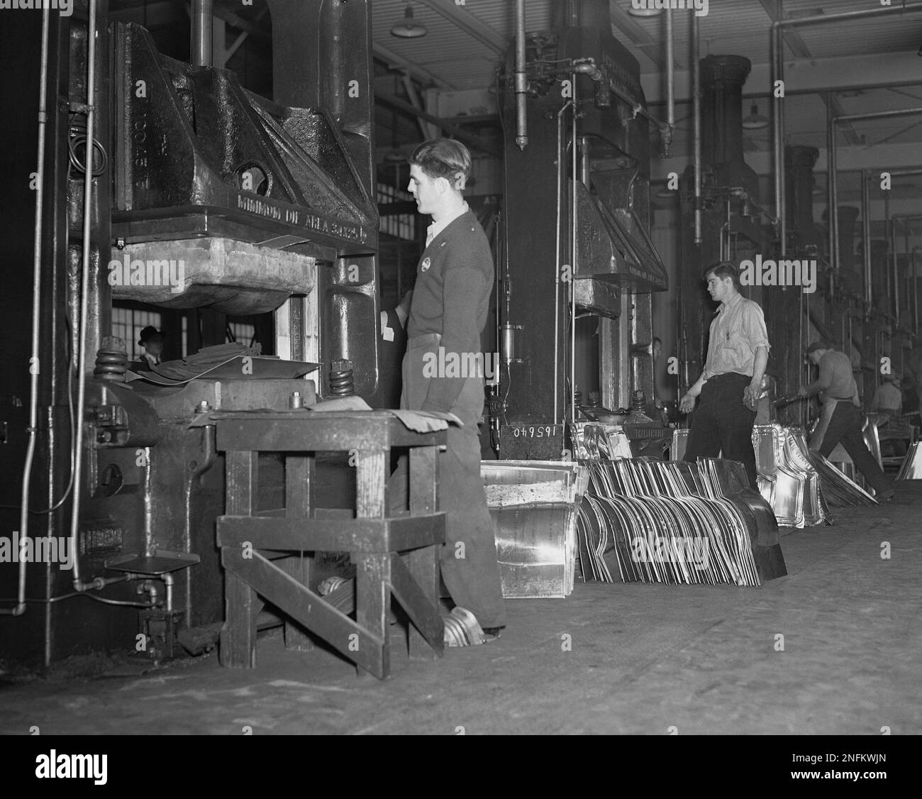 A line of drop hammers shown operating at the Glenn Martin Plant