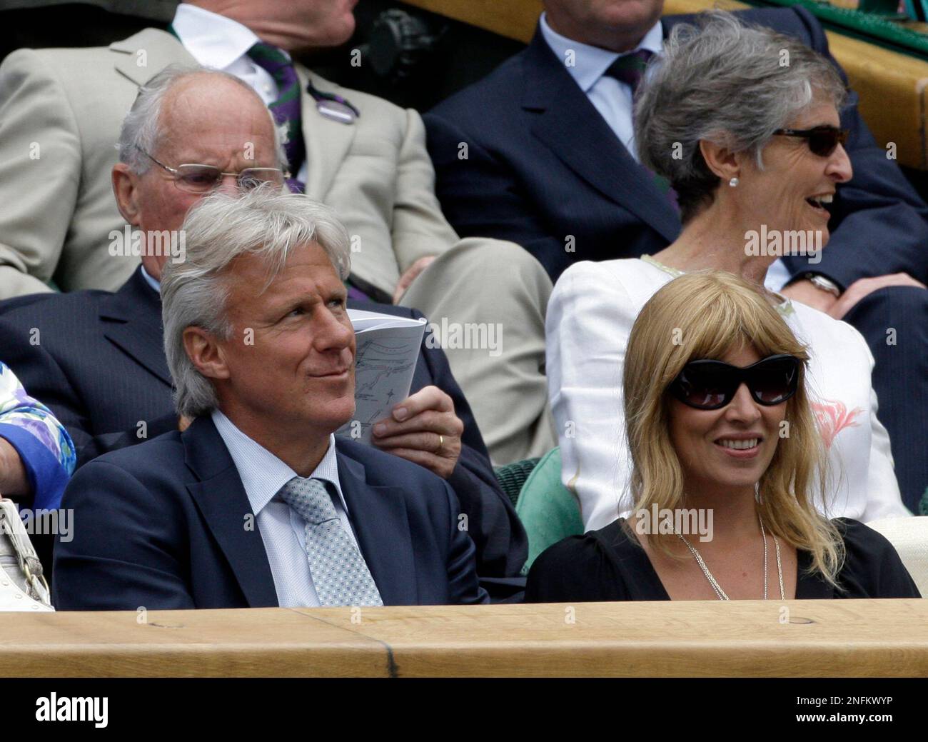 Former champion Bjorn Borg and his wife Patricia sit in the Royal Box