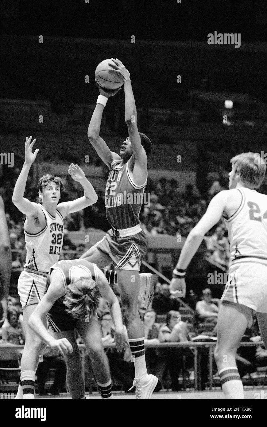 South Carolina's Alex English (22) prepares to score after recovering