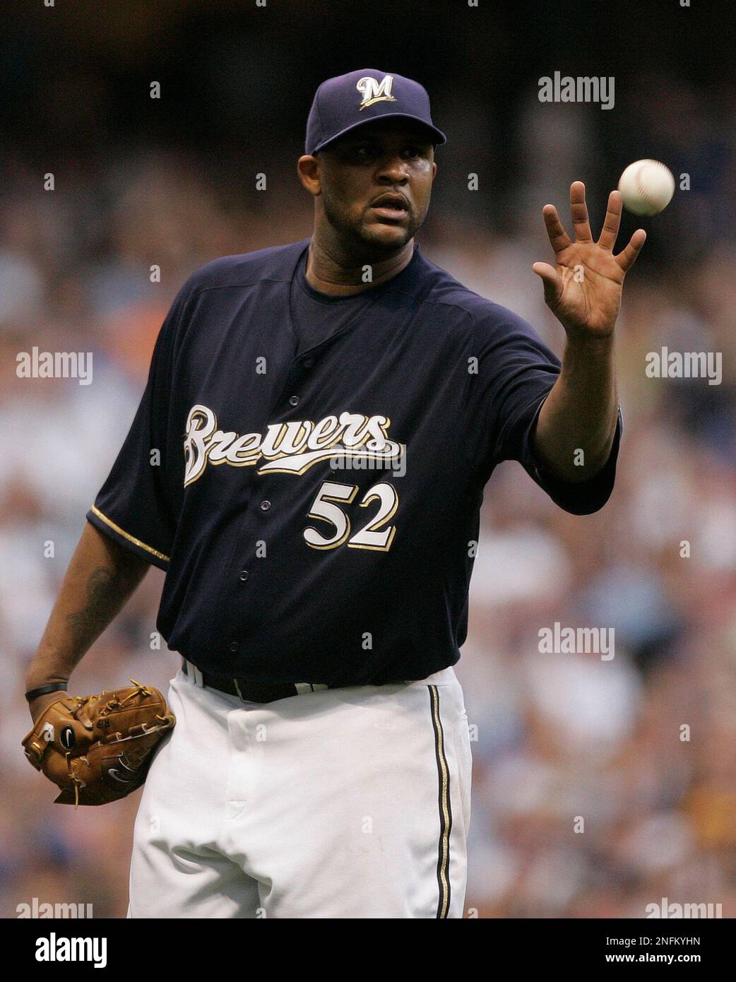 Milwaukee Brewers starting pitcher CC Sabathia catches a ball during the  sixth inning of a baseball game Tuesday, July 8, 2008, in Milwaukee. (AP  Photo/Morry Gash Stock Photo - Alamy