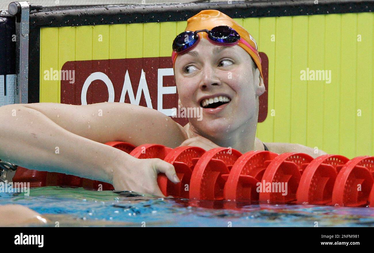 Christine Magnuson smiles after setting the fastest time in the in