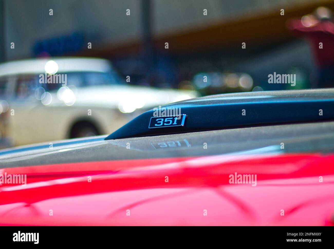 Red and Black Ford Mustang with 351 engine Engine Hood Stock Photo