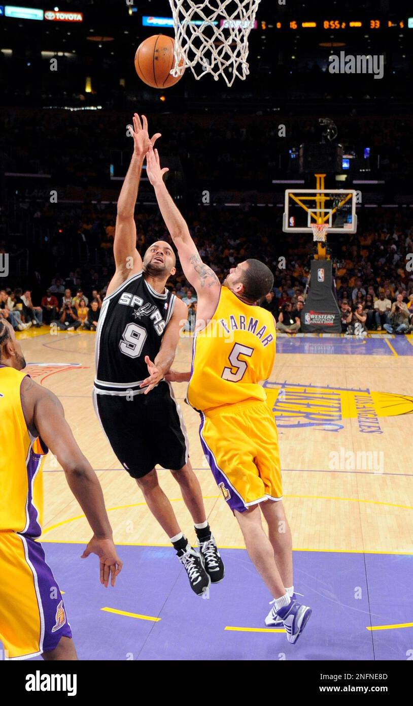 San Antonio Spurs guard Tony Parker (9), of France, puts up a shot as Los  Angeles Lakers guard Jordan Farmar (5) guards during the first half in Game  5 of the NBA