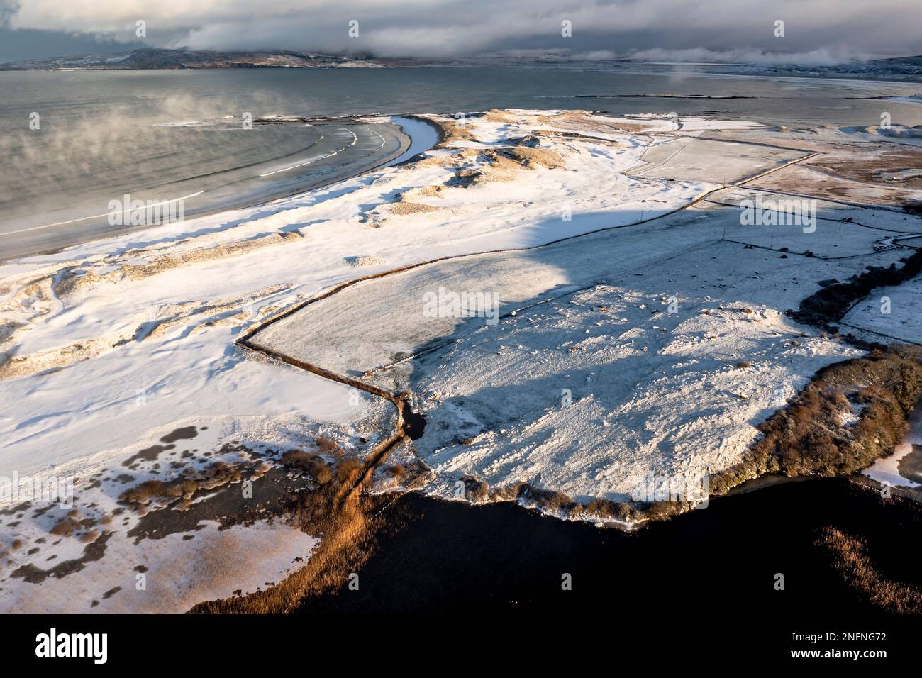 Aerial view of the snow covered Narin Portnoo Golf links in County Donegal, Ireland. Stock Photo
