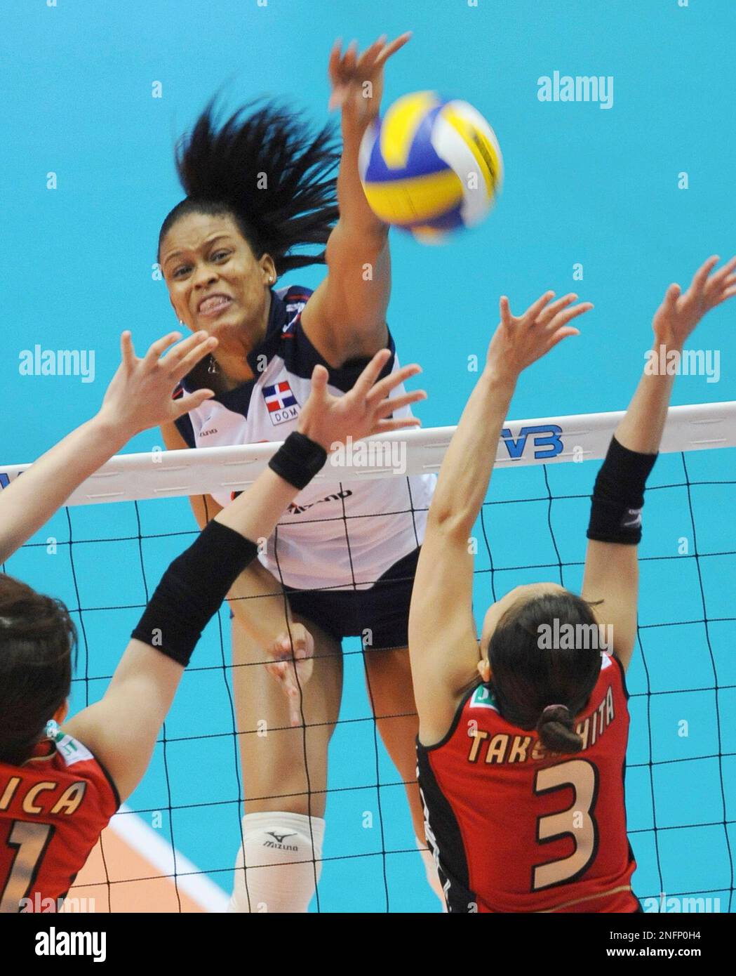Sidarka Nunez of the Dominican Republic spikes the ball to