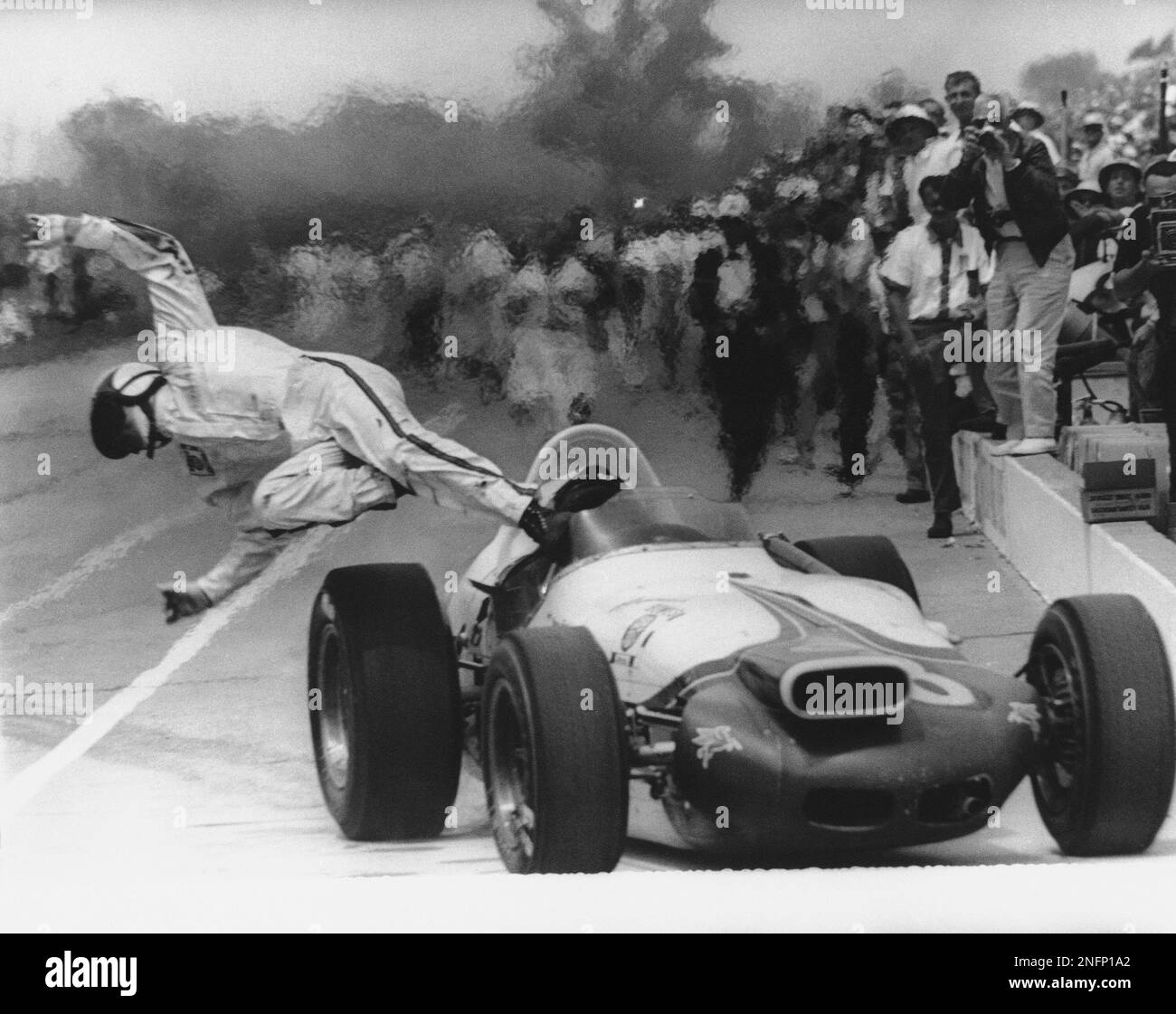 Parnelli Jones, defending 500 mile race champion, dived