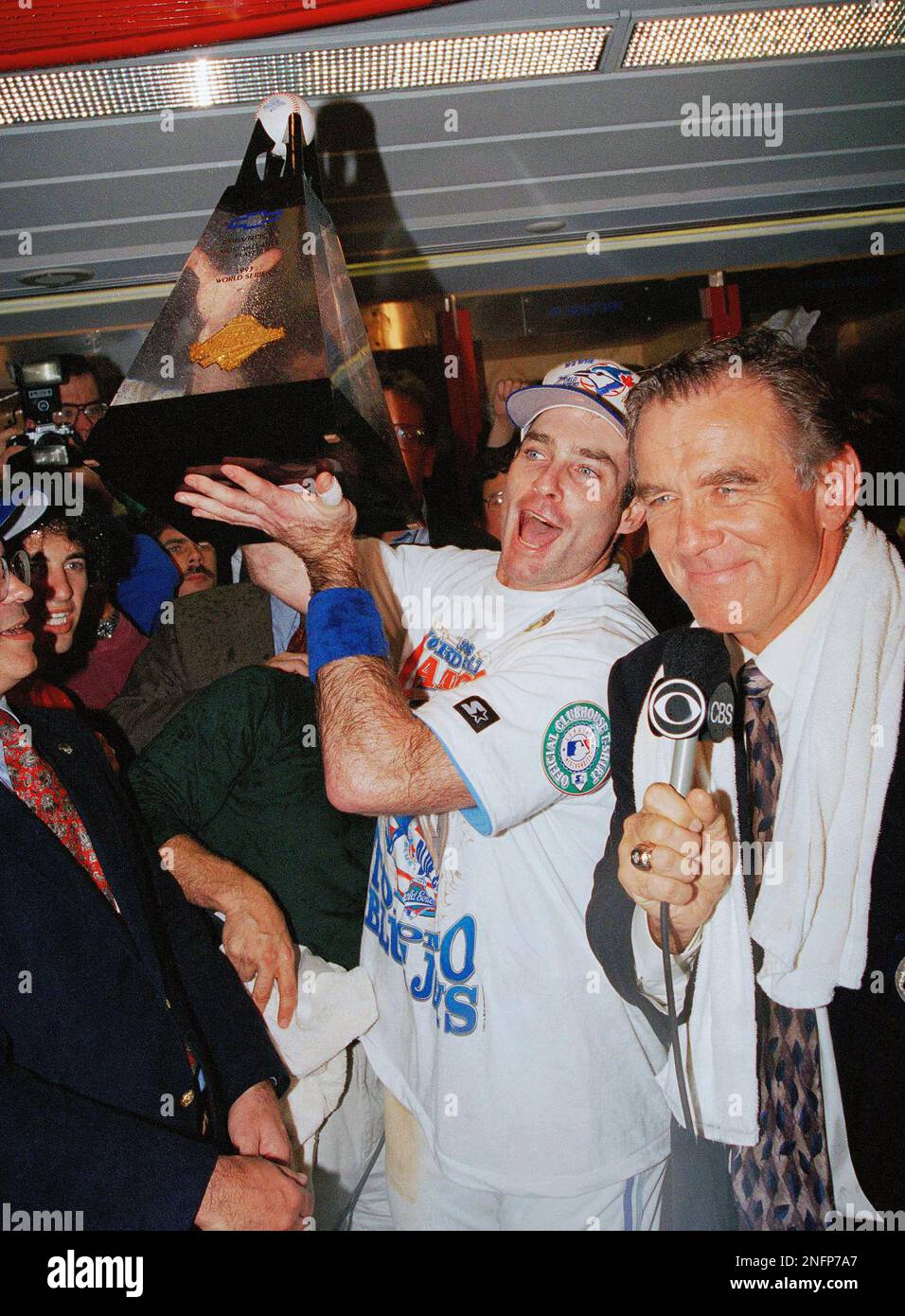 Toronto Blue Jays' Paul Molitor hoists the World Series MVP trophy in the  Jays' dressing room after their World Series victory on, Oct. 23, 1993 at  Sky Dome in Toronto. The Jays