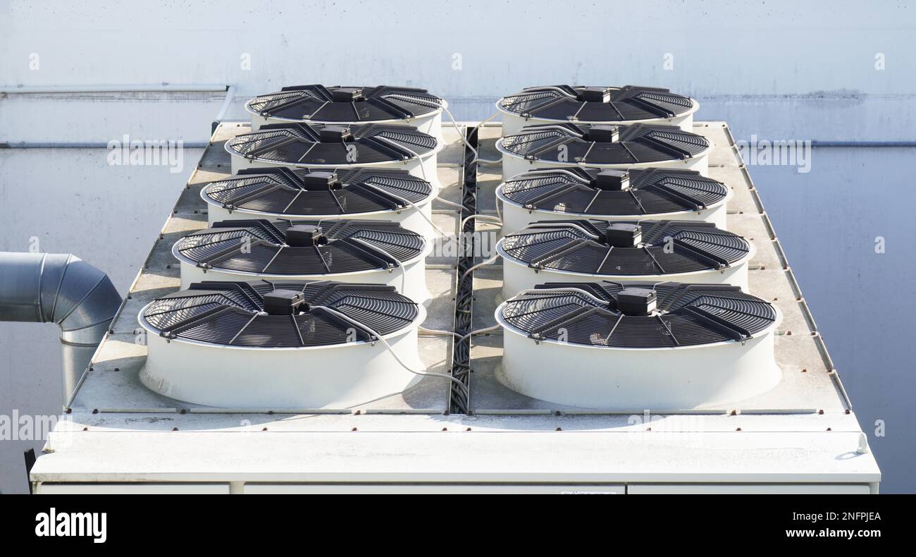 ac system with air conditioning units on roof of building Stock Photo Alamy