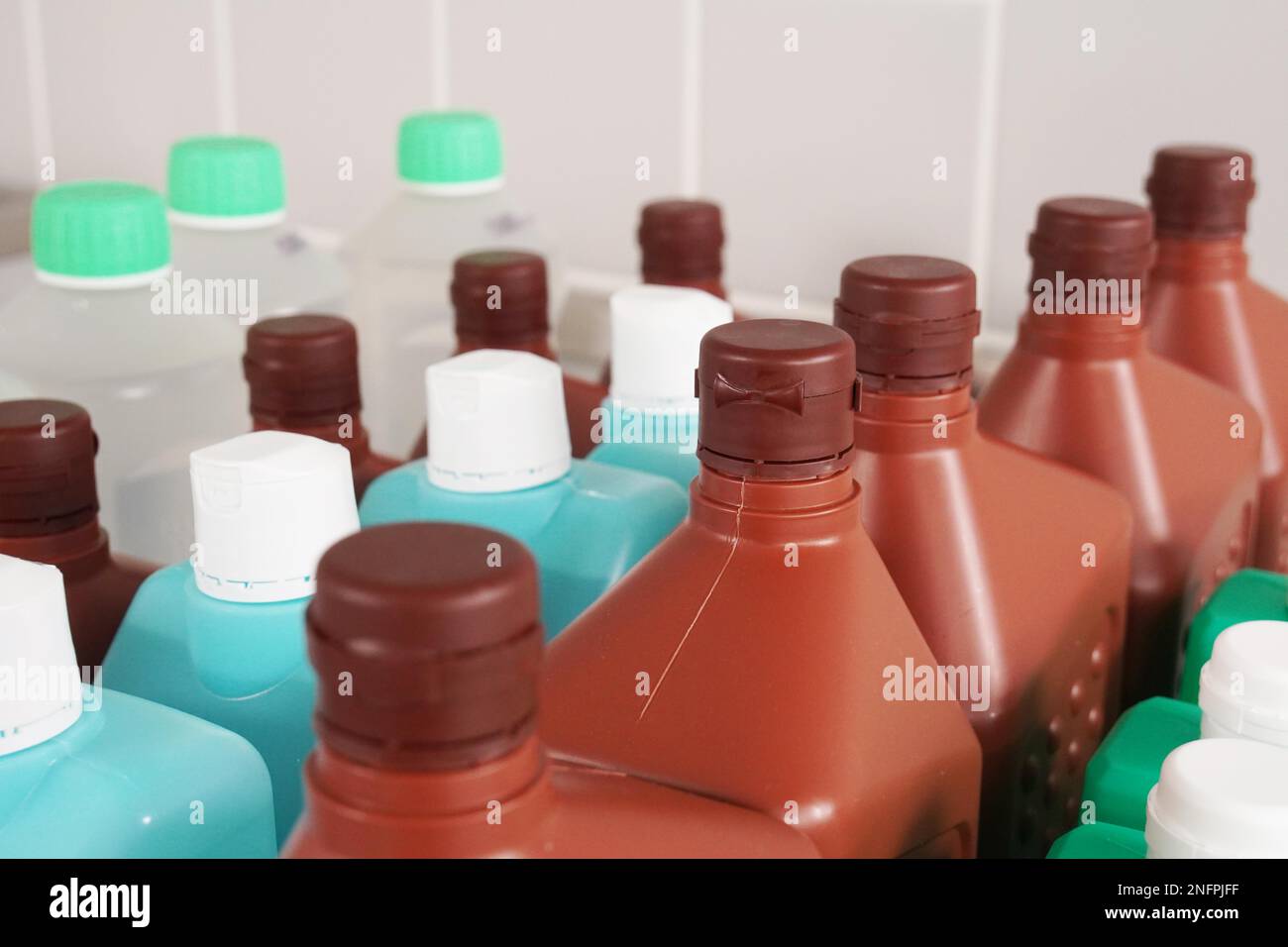 bottles with cleaning and disinfection solution or sanitizer or