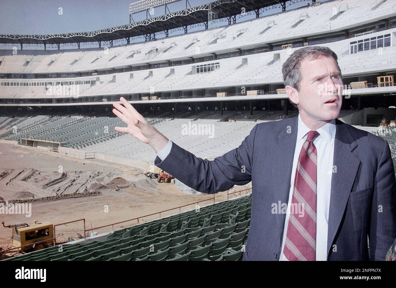 George W. Bush points out some of the amenities Thursday, Nov. 7, 1993 ...