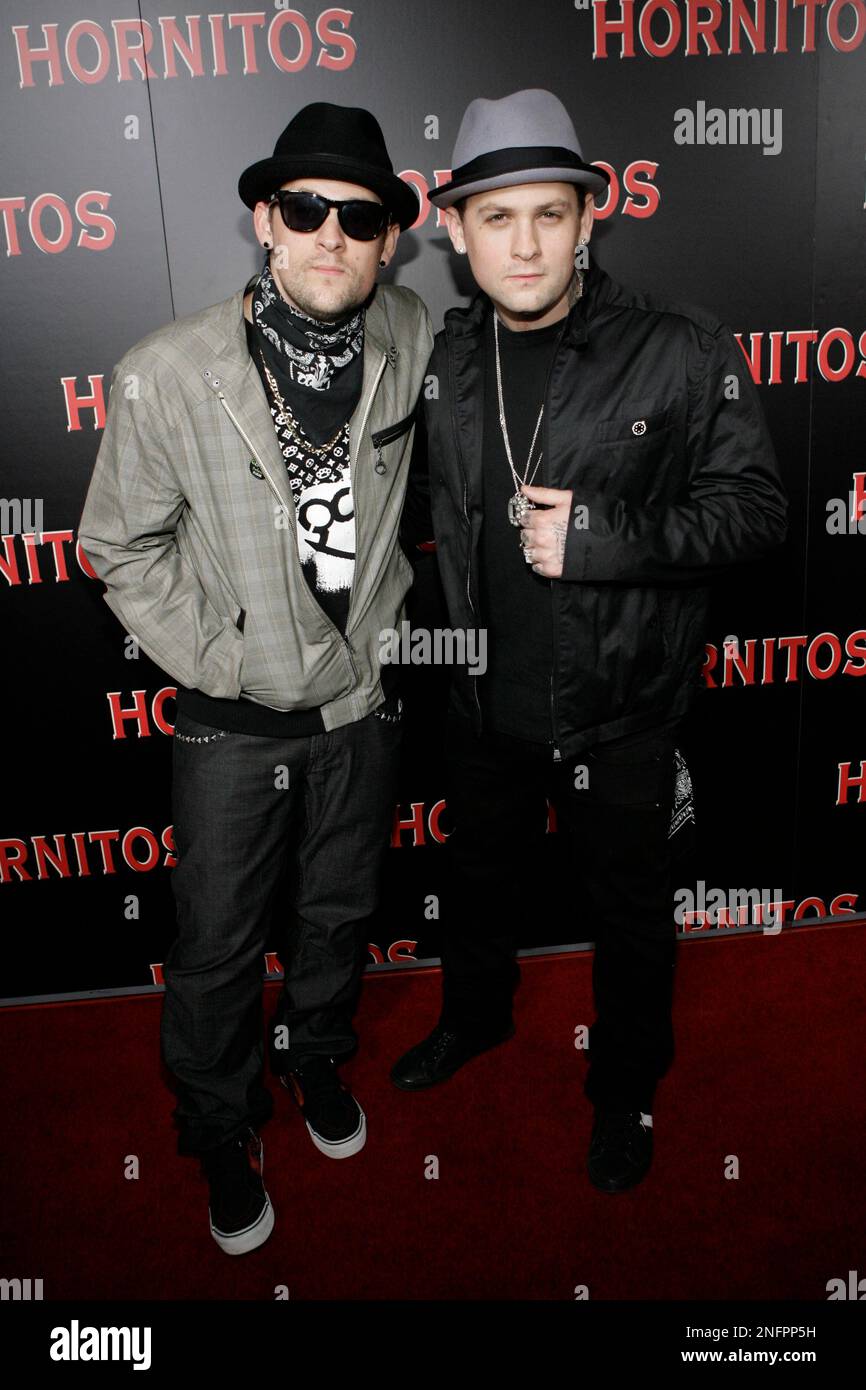 Identical twin brothers Joel Madden, left, and Benji Madden, right ...