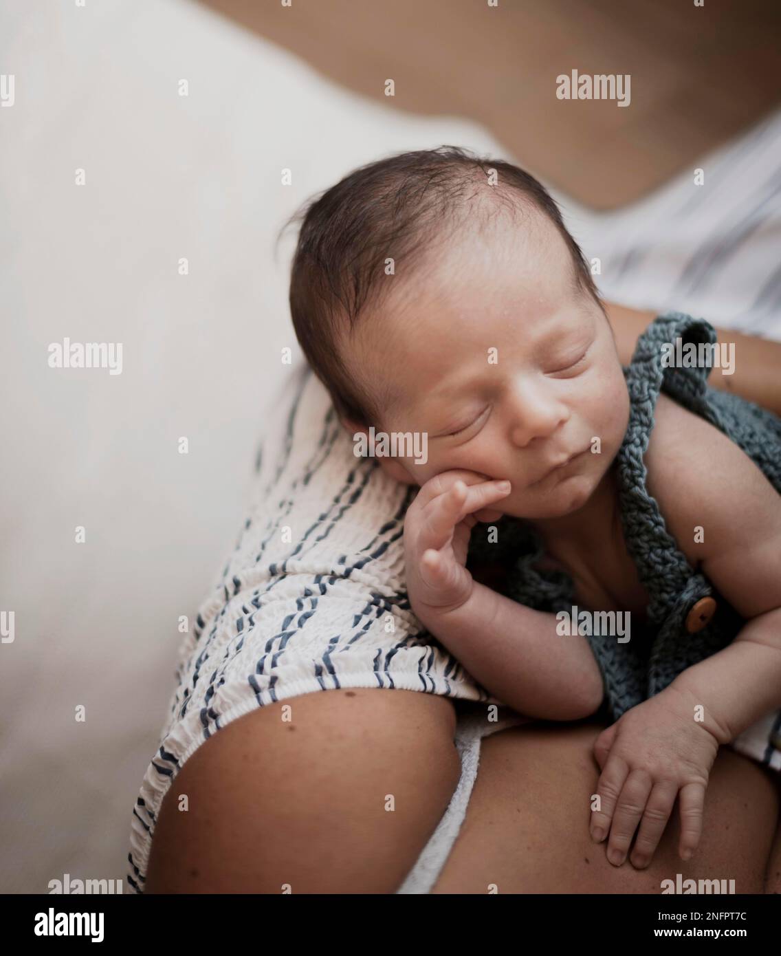 adorable little baby mother hands Stock Photo