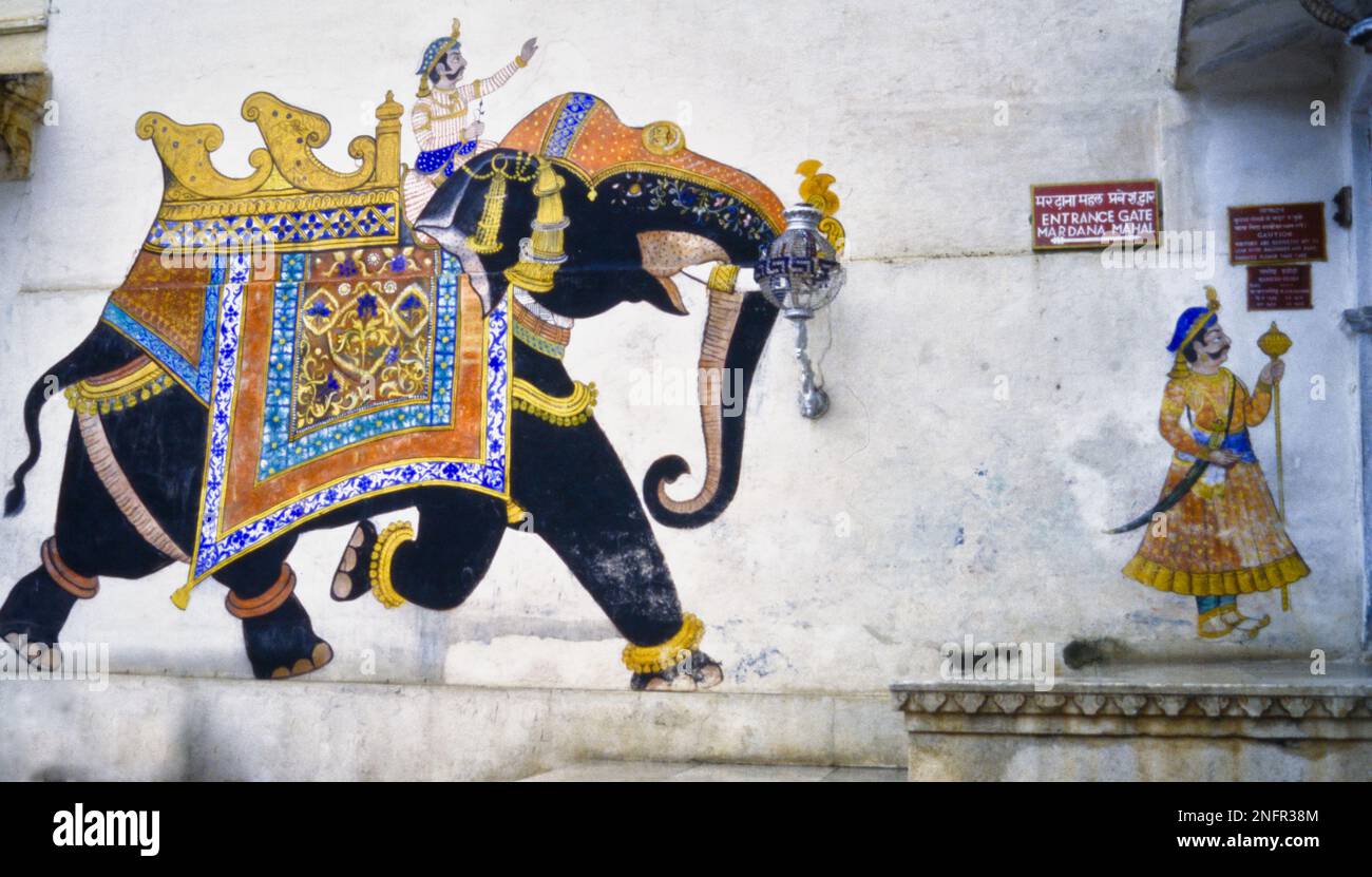 Historic Archive Image Of Wall Art, Street Painting Of A Mahoot Riding An Indian Elephant At The Entrance To The City Palace, Udaipur, 1990 Stock Photo