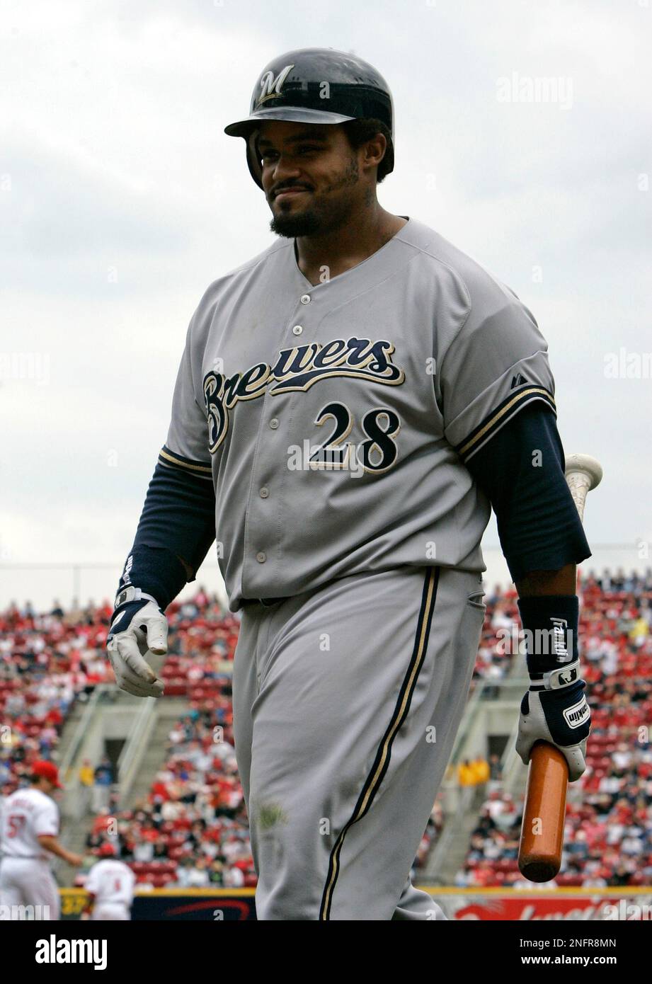 Milwaukee Brewers Prince Fielder walks off the field with wife