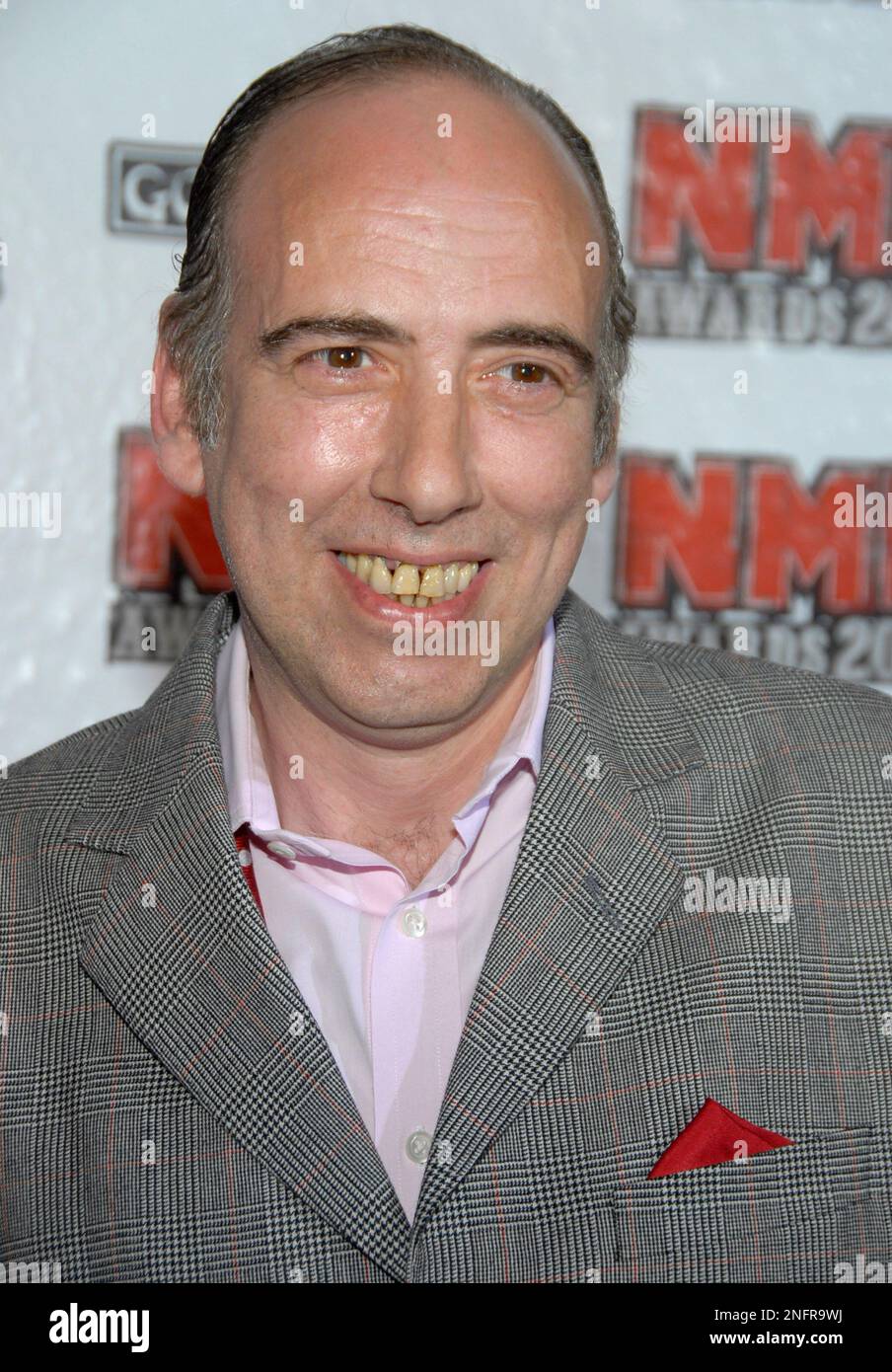 Singer and musician Mick Jones poses on the press line at the NME