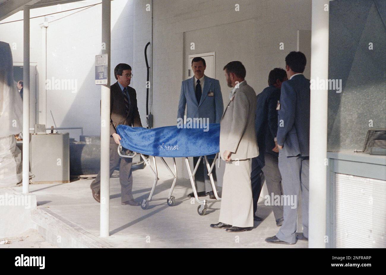 The body of Theodore Bundy arrives at the Medical Examiner's office