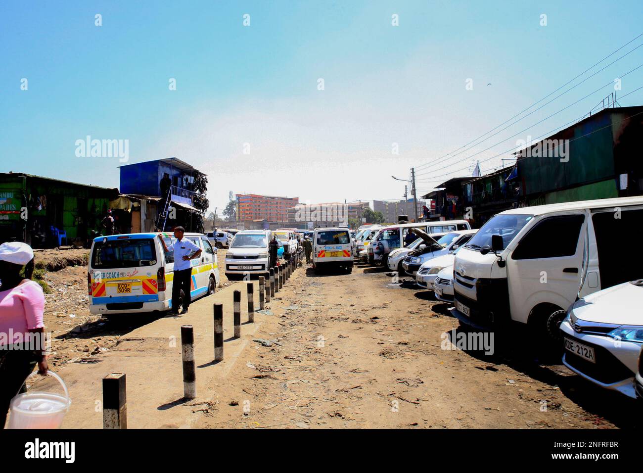 Public service vehicles parked by the roadside in Central Business